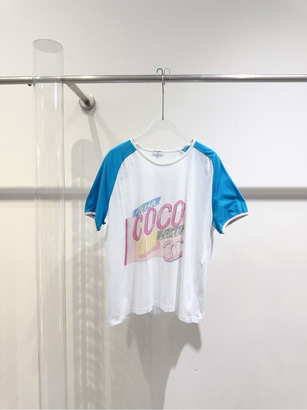 CHANEL White Tee with Bright Blue Raglan Sleeves and Multicolor COCO Graphic